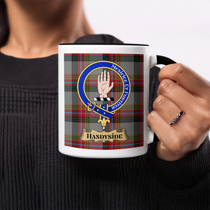 Handyside 11 oz ceramic mug with family crest design on a tartan background