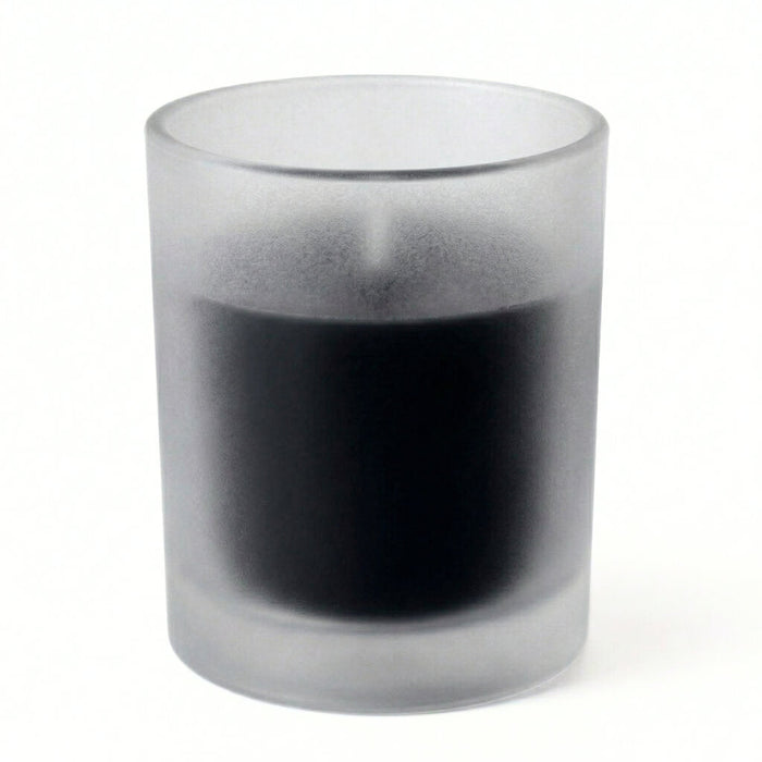 Black unscented candle in frosted glass votive holder