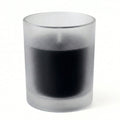 Black unscented candle in frosted glass votive holder