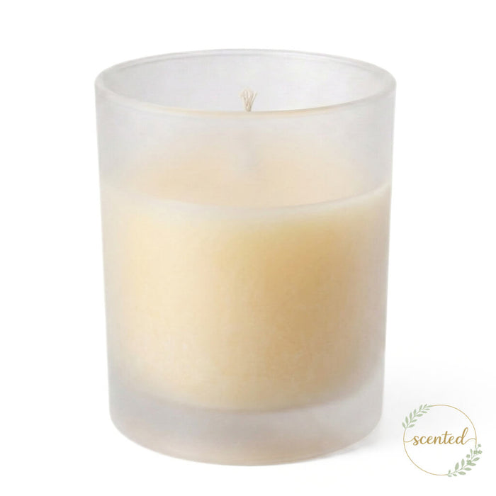 Vanilla scented candle in frosted glass candle holder