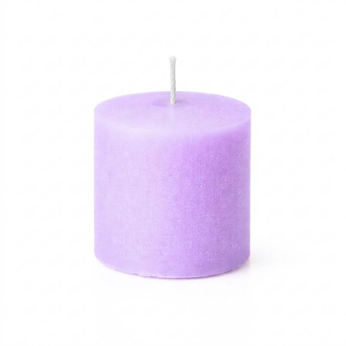 A lavender votive candle with an unlit wick