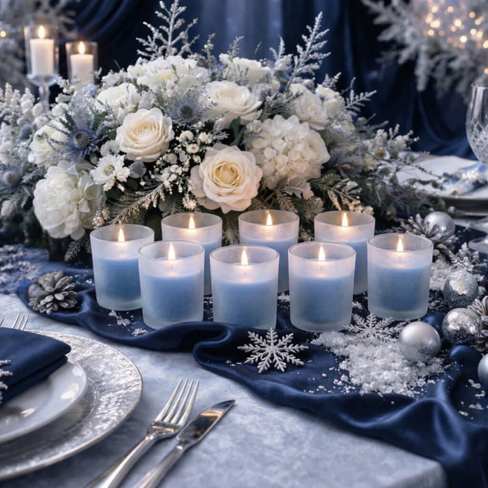 Frosted Votive Holders with blue candles on a winter wonderland tablescape