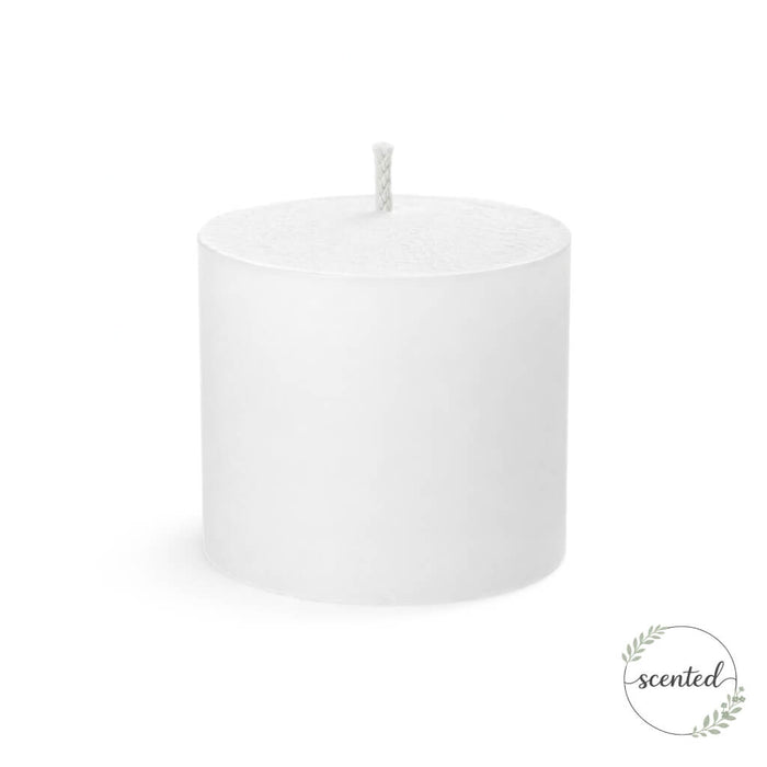 A single white citronella scented pillar candle