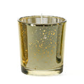 White unscented candle in metallic gold mercury glass candle holder