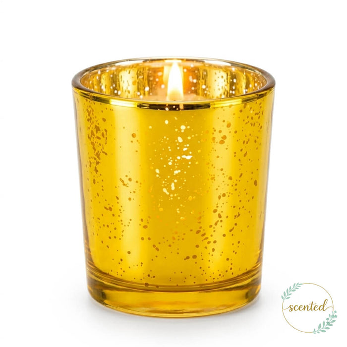 A fresh laundry scented Gold Mercury Votive Holder cup on a white background with a logo