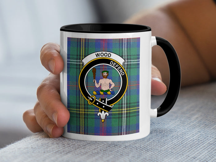 Wood Scottish family crest artwork on an 11 oz black accent mug with a tartan background